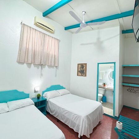Hotel Petenchel Flores Extérieur photo
